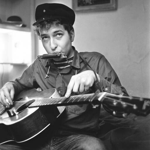 Bob Dylan tunes his guitar 