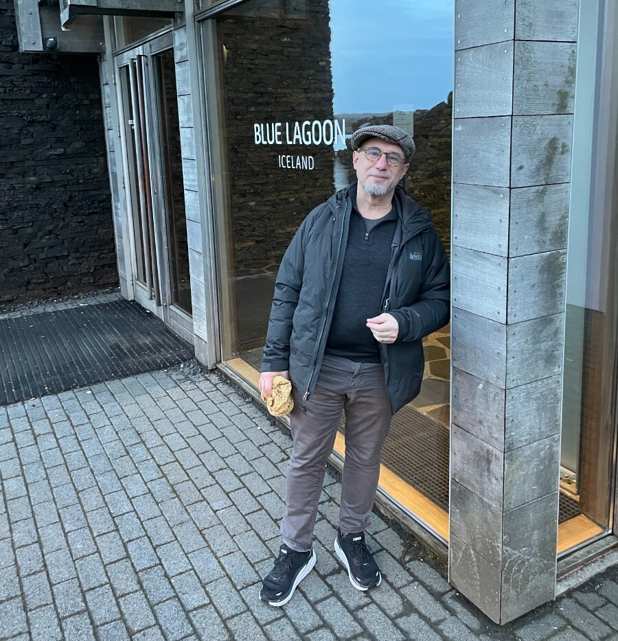 man standing in front of the blue lagoon entrance