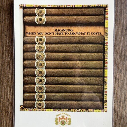 an advertisement for macanudo cigars